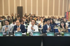 Các đại biểu tham dự sự kiện: Ngày Thẻ Việt Nam 2025. (Ảnh: Vietnam+)