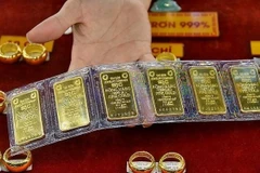 Thị trường vàng vẫn chưa thực sự ổn định bền vững. (Ảnh: Vietnam+)