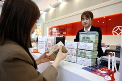 Ngân hàng Nhà nước định hướng tăng trưởng tín dụng năm 2026 khoảng 15%. (Ảnh: Vietnam+)