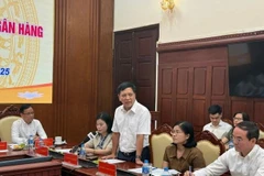 Ông Đào Xuân Tuấn - Cục trưởng Cục Quản lý Ngoại hối - Ngân hàng Nhà nước chia sẻ về thị trường vàng tại họp báo. (Ảnh: Vietnam+)