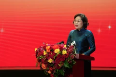 Bà Nguyễn Thị Hồng - Ủy viên Ban Chấp hành Trung ương Đảng, Chủ tịch Hội đồng thi đua khen thưởng ngành Ngân hàng - Thống đốc NHNN phát biểu khai mạc Đại hội. (Ảnh: Vietnam+)