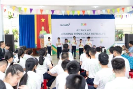 Herbalife Việt Nam hỗ trợ dinh dưỡng cho hơn 3.000 người có hoàn cảnh khó khăn. (Ảnh: PV/Vietnam+)