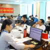 Người dân đến làm thủ tục hành chính tại Trung tâm phục vụ hành chính công xã Đông Anh (Hà Nội). (Ảnh: Quốc Lũy/TTXVN)