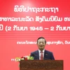 Đại sứ Việt Nam tại Lào Nguyễn Minh Tâm chia sẻ tại sự kiện về ý nghĩa lịch sử của Cách mạng Tháng Tám và Quốc khánh 2/9, cùng những thành tựu của Việt Nam sau 80 năm, đặc biệt sau gần 40 năm đổi mới. (Ảnh: Xuân Tú/TTXVN)