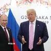 Ông Donald Trump, khi đương chức Tổng thống Mỹ, và Tổng thống Nga Vladimir Putin tại cuộc gặp bên lề Hội nghị thượng đỉnh G20 ở Osaka, Nhật Bản, ngày 28/6/2019. Ảnh: Reuters/TTXVN)