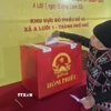 Cử tri xã A Lưới 1, thành phố Huế tham gia bỏ phiếu. (Ảnh: Mai Trang/TTXVN)