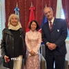 Đại sứ Ngô Minh Nguyệt và đại diện Viện Văn hóa Argentina-Việt Nam. (Ảnh: Diệu Hương/TTXVN)