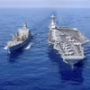 Tàu sân bay USS Gerald R. Ford nhận nhiên liệu từ tàu tiếp tế dầu USNS Laramie trên đường đến Địa Trung Hải ngày 11/10/2023. (Ảnh: AP)