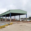 Cảng cá Hồng Triều (thành phố Đà Nẵng) đã được đưa vào khai thác nhưng chưa làm thủ tục bàn giao và chưa có đơn vị nào đứng ra quản lý hoạt động. (Ảnh: Đỗ Trưởng/TTXVN)