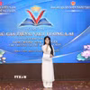 Thí sinh Đội thi Trường Hữu nghị Lào-Việt Nam thể hiện khả năng nói tiếng Việt trong phần tham luận tại cuộc thi. (Ảnh: Xuân Tú/TTXVN)