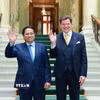 Thủ tướng Phạm Minh Chính hội kiến Chủ tịch Quốc hội Thụy Điển Andreas Norlén. (Ảnh: Dương Giang/TTXVN)