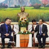 Ủy viên Bộ Chính trị, Thường trực Ban Bí thư, Phó Chủ tịch nước Lào Bounthong Chitmany tiếp Bí thư Trung ương Đoàn Nguyễn Tường Lâm. (Ảnh: Xuân Tú/TTXVN)