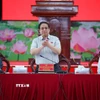 Thủ tướng Phạm Minh Chính chủ trì họp triển khai các dự án giao thông trọng điểm khu vực phía Nam. (Ảnh: Dương Giang/TTXVN)