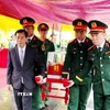 Lễ viếng, truy điệu và an táng 34 hài cốt liệt sỹ tại Nghĩa trang Liệt sỹ phường Quảng Trị, tỉnh Quảng Trị. (Ảnh: Võ Dung/TTXVN)