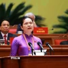 Đồng chí Hà Thị Nga, Ủy viên Trung ương Đảng, Phó Bí thư Thường trực Đảng ủy Mặt trận Tổ quốc, các đoàn thể Trung ương, Phó Chủ tịch, Tổng Thư ký Ủy ban Trung ương Mặt trận Tổ quốc Việt Nam, tham luận về vấn đề “Phát huy sức mạnh đoàn kết toàn dân tộc – nền tảng, động lực quan trọng thực hiện thắng lợi các mục tiêu phát triển đất nước trong kỷ nguyên mới”. (Ảnh: TTXVN)