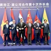 Phó Thủ tướng, Bộ trưởng Ngoại giao Bùi Thanh Sơn (ngoài cùng bên trái) cùng lãnh đạo các nước Lào, Thái Lan, Trung Quốc, Campuchia, Myanmar, chụp ảnh chung. (Ảnh: TTXVN phát)