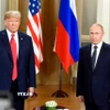 Tổng thống Nga Vladimir Putin (phải) và Tổng thống Mỹ Donald Trump tại cuộc gặp ở Helsinki, Phần Lan, ngày 16/7/2018. (Ảnh: THX/TTXVN)