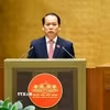 Chủ nhiệm Ủy ban Pháp luật và Tư pháp của Quốc hội Hoàng Thanh Tùng - Đại diện Ủy ban dự thảo sửa đổi, bổ sung một số điều của Hiến pháp năm 2013 trình bày Báo cáo giải trình, tiếp thu ý kiến về sửa đổi, bổ sung một số điều của Hiến pháp năm 2013. (Ảnh: Doãn Tấn/TTXVN)