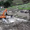 Lực lượng cứu hộ khắc phục hậu quả lũ lụt tại vùng Gilgit-Baltistan, miền Bắc Pakistan, ngày 24/7/2025. (Ảnh: THX/TTXVN)