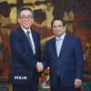 Thủ tướng Phạm Minh Chính tiếp Bộ trưởng Ngoại giao Hàn Quốc Cho Tae-yul. (Ảnh: Dương Giang/TTXVN)
