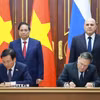 Thủ tướng Phạm Minh Chính và Thủ tướng Liên bang Nga Mikhail Mishustin chứng kiến Lễ ký kết Hiệp định về hợp tác xây dựng Nhà máy điện hạt nhân trên lãnh thổ Việt Nam. (Ảnh: Dương Giang/TTXVN)