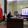 Tổng thống Nga Vladimir Putin họp trực tuyến với Chủ tịch Trung Quốc Tập Cận Bình tại dinh thự nhà nước Novo-Ogaryovo ở Moskva ngày 21/1. (Ảnh: Sputnik)