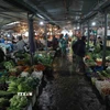 Giá rau xanh hiện đã hạ nhiệt, ngoại trừ ca chua và ớt. (Ảnh: Vũ Sinh/TTXVN)