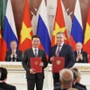 Tổng Bí thư Tô Lâm và Tổng thống Vladimir Putin chứng kiến trao Thỏa thuận giữa 2 Bộ Khoa học và Công nghệ về hợp tác cùng tuyển chọn các đề tài, dự án nghiên cứu khoa học và công nghệ Việt - Nga. (Ảnh: Thống Nhất/TTXVN)
