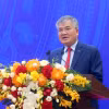 Phó Chủ nhiệm Văn phòng Chủ tịch nước Cấn Đình Tài công bố Quyết định đặc xá năm 2026 của Chủ tịch nước Cộng hoà xã hội chủ nghĩa Việt Nam. (Ảnh: Phạm Kiên/TTXVN)