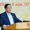Thủ tướng Phạm Minh Chính phát biểu tại Hội nghị tổng kết đợt cao điểm đấu tranh ngăn chặn buôn lậu, gian lận thương mại, hàng giả. (Ảnh: Dương Giang/TTXVN)