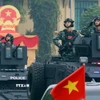 Khối xe đặc chủng của lực lượng Công an tham gia diễu hành tại buổi lễ. (Ảnh: Phạm Kiên/TTXVN)