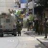 Các lực lượng Israel được triển khai tại thành phố Nablus, Bờ Tây. (Ảnh: THX/TTXVN)