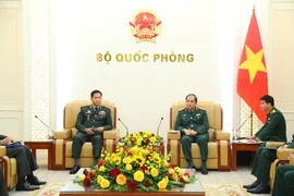 Thượng tướng Phùng Sĩ Tấn và Đại tướng Phorn Nara tại buổi tiếp. (Ảnh: BQP)
