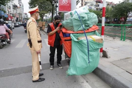 Xử lý nghiêm các shipper chở hàng che khuất biển số “né” camera AI 