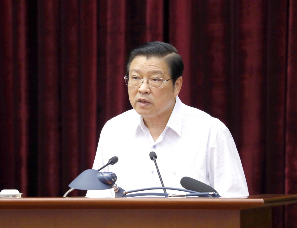 Ông Phan Đình Trạc, Ủy viên Bộ Chính trị, Bí thư Trung ương Đảng, Trưởng Ban Nội chính Trung ương, Phó Trưởng Ban Thường trực Ban Chỉ đạo Trung ương về phòng, chống tham nhũng, tiêu cực trình bày báo cáo tại hội nghị. (Ảnh: Phương Hoa/TTXVN)