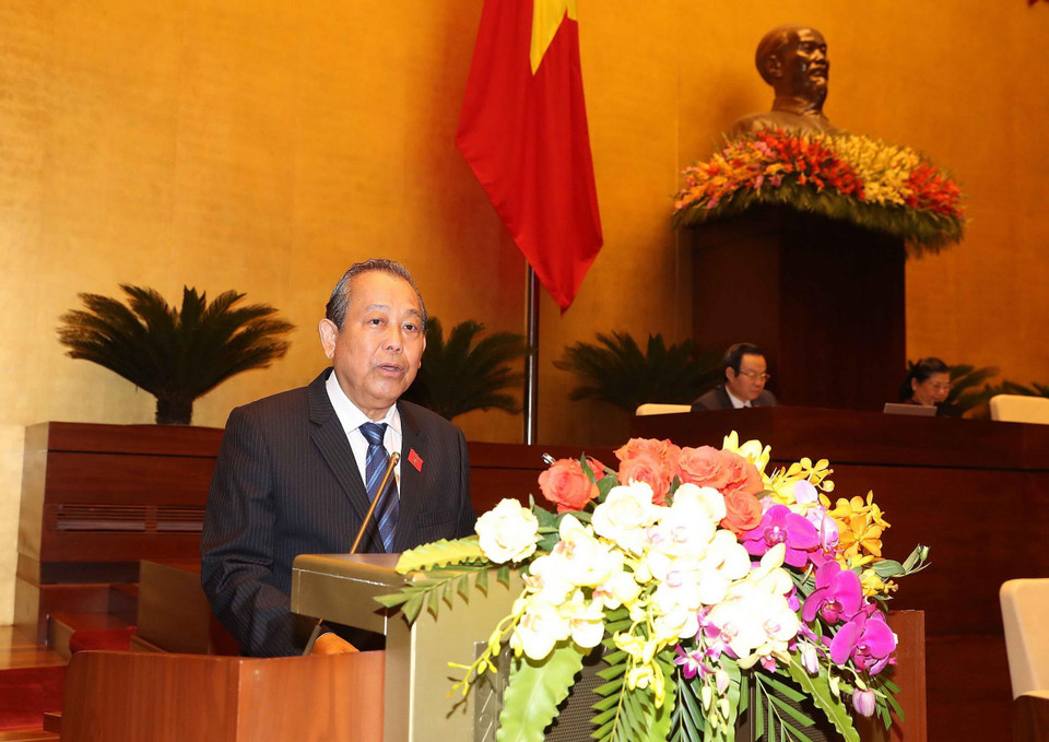 Phó Thủ tướng Thường trực Chính phủ Trương Hòa Bình trình bày Báo cáo đánh giá bổ sung kết quả thực hiện kế hoạch phát triển kinh tế-xã hội và ngân sách nhà nước năm 2018; tình hình thực hiện kế hoạch phát triển kinh tế-xã hội và ngân sách nhà nước những tháng đầu năm 2019. (Ảnh: Trọng Đức/TTXVN)