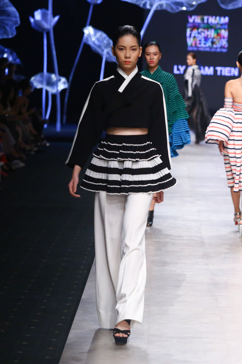 Bước ra từ cuộc thi Nhà thiết kế Thời trang – Project Runway Vietnam 2014 với ngôi vị Quán quân, Lý Giám Tiền được xem là 'thần đồng thời trang' khi có phong cách thiết kế và kỹ thuật tạo hình thời trang đầy thẩm mỹ.