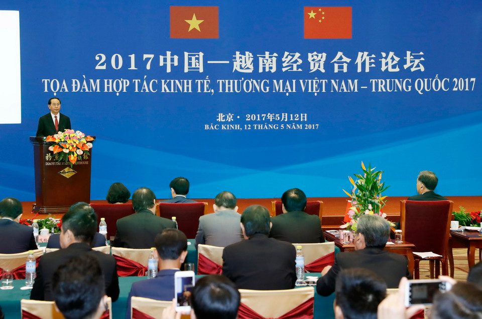  Chủ tịch nước Trần Đại Quang phát biểu tại buổi Toạ đàm hợp tác Kinh tế, Thương mại Việt-Trung. (Ảnh: Nhan Sáng/TTXVN)