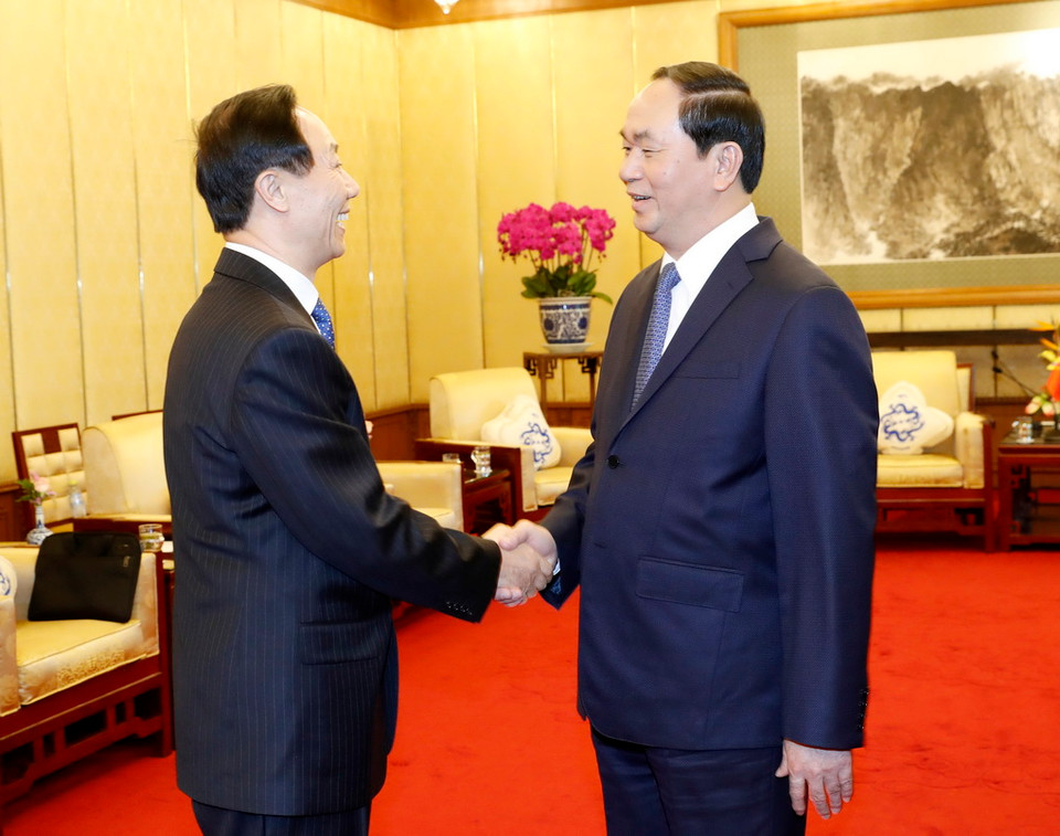 Chủ tịch nước Trần Đại Quang tiếp ông Vương Gia Thụy, Phó Chủ tịch Chính hiệp Trung Quốc tới chào xã giao. (Ảnh: Nhan Sáng/TTXVN)