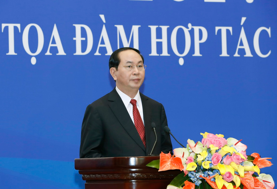  Chủ tịch nước Trần Đại Quang phát biểu tại buổi Tọa đàm hợp tác Kinh tế, Thương mại Việt-Trung. (Ảnh: Nhan Sáng/TTXVN)