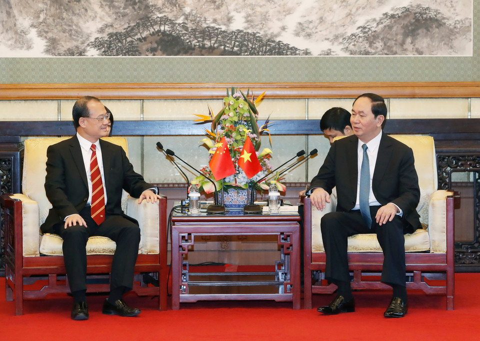  Chủ tịch nước Trần Đại Quang tiếp Chủ tịch Tập đoàn Sunwa Hong Kong. (Ảnh: Nhan Sáng/TTXVN)