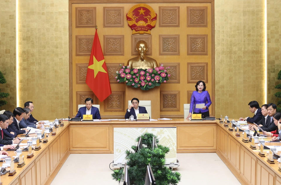 Thống đốc Ngân hàng Nhà nước Việt Nam Nguyễn Thị Hồng báo cáo tình hình hoạt động trong lĩnh vực ngân hàng. (Ảnh: Dương Giang/TTXVN)