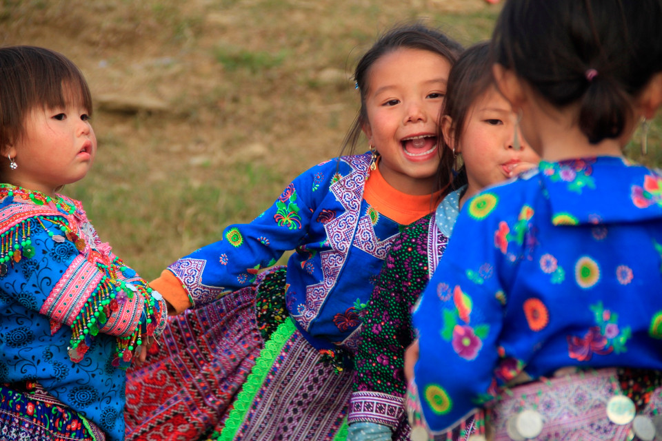 Em đi chơi hội. (Ảnh: Xuân Mai/Vietnam+)