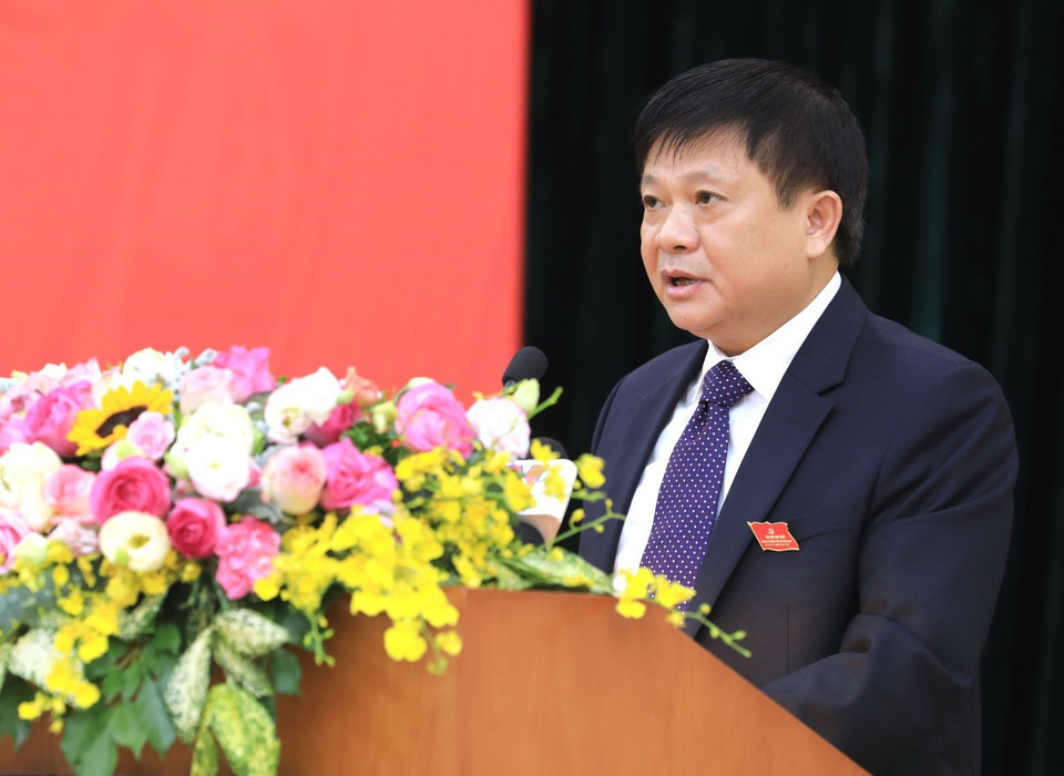 Ông Đinh Đăng Quang, Phó Bí thư Đảng ủy, Phó Tổng Giám đốc TTXVN phát biểu báo cáo tổng kết Đại hội nhiệm kỳ 2015-2020 và phương hướng nhiệm kỳ 2020-2025. (Ảnh: Thành Đạt/TTXVN)