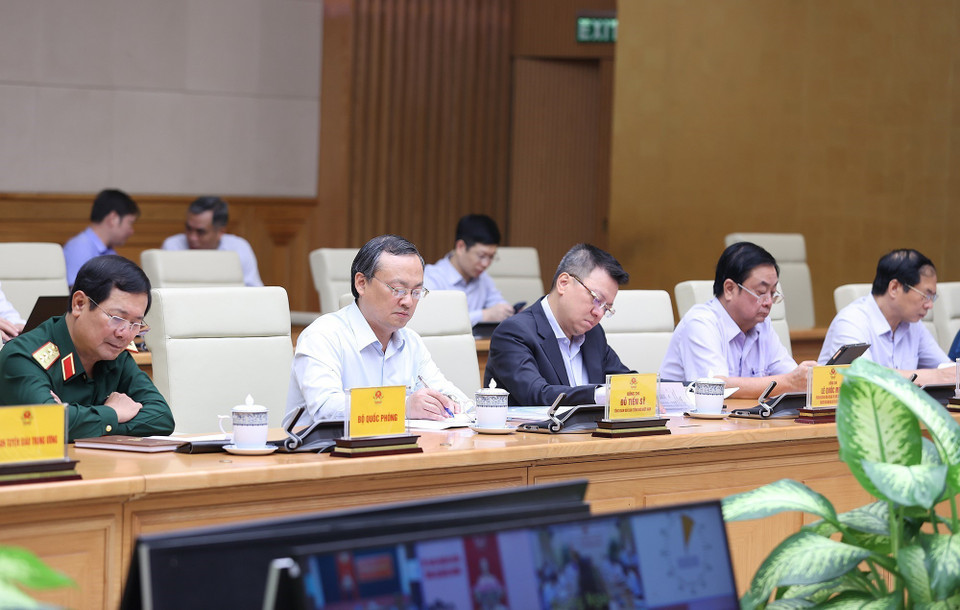 Các thành viên Ban Chỉ đạo phòng, chống dịch COVID-19 tham dự phiên họp tại điểm cầu Chính phủ. (Ảnh: Dương Giang/TTXVN)