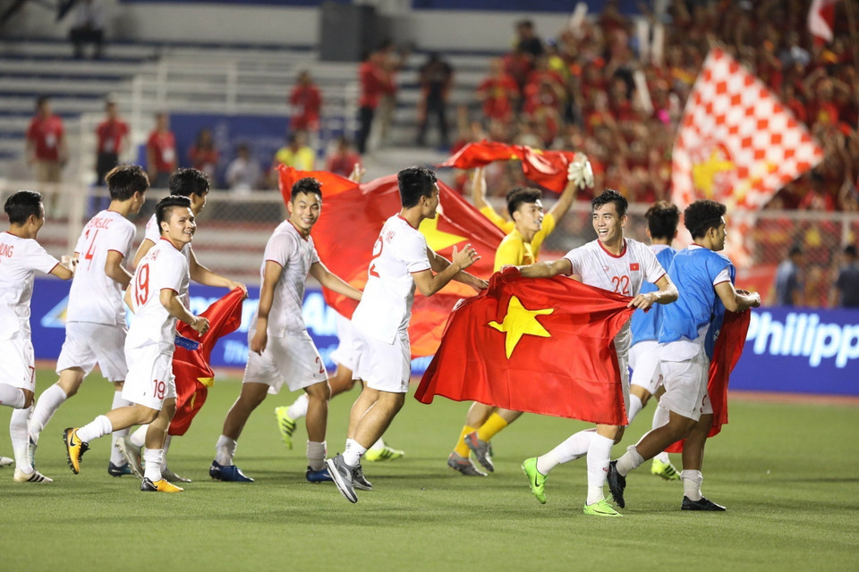 Thông tin của TTXVN về hành trình chinh phục HCV tại SEA Games 30 của đội tuyển bóng đá U22 Việt Nam không chỉ góp phần khẳng định vị trí của bóng đá Việt Nam tại khu vực mà còn tiếp tục nâng tầm của thể thao Việt Nam ở khu vực và quốc tế trong thời kỳ hội nhập sâu rộng. (Ảnh: TTXVN)