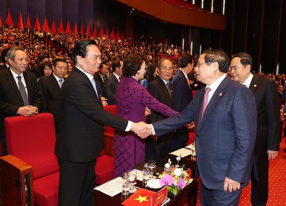 Các lãnh đạo, nguyên lãnh đạo Đảng, Nhà nước và đại biểu dự Đại hội. (Ảnh: TTXVN)