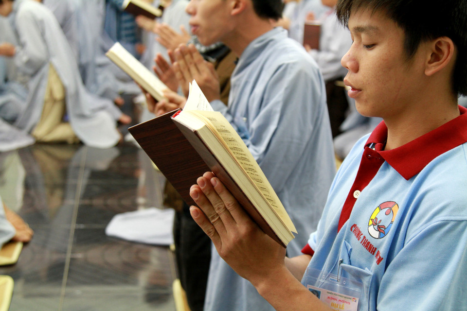 Cùng các chúng thanh niên. (Ảnh: Xuân Mai/Vietnam+)