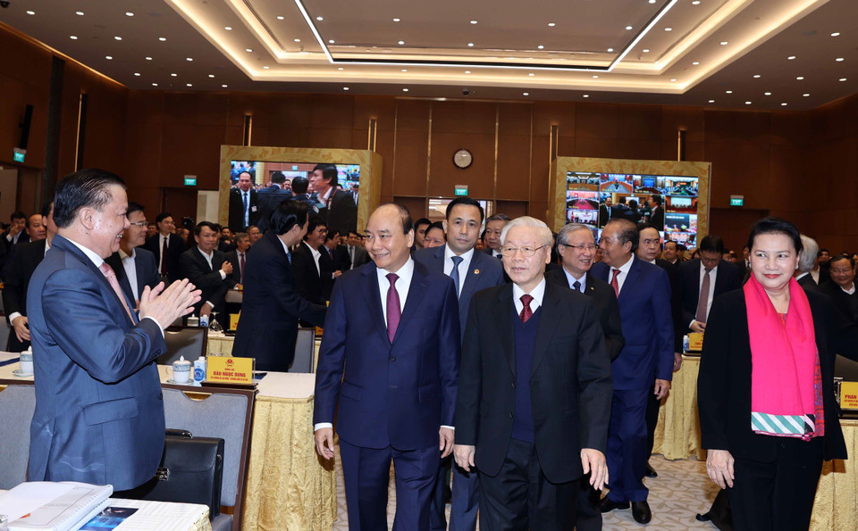 Tổng Bí thư, Chủ tịch nước Nguyễn Phú Trọng, Thủ tướng Nguyễn Xuân Phúc, Thủ tướng Nguyễn Xuân Phúc, Chủ tịch Quốc hội Nguyễn Thị Kim Ngân và các đại biểu đến dự tại điểm cầu Hà Nội. (Ảnh: Thống Nhất/TTXVN)