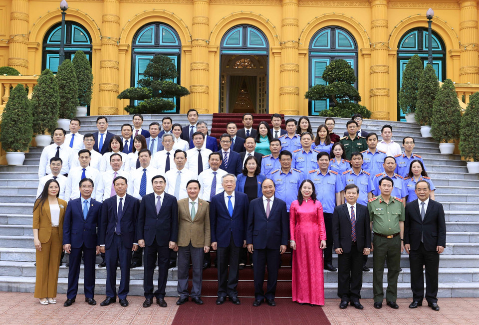 Chủ tịch nước Nguyễn Xuân Phúc với các đại biểu dự Lễ ký Quy chế phối hợp công tác. (Ảnh: Thống Nhất/TTXVN)